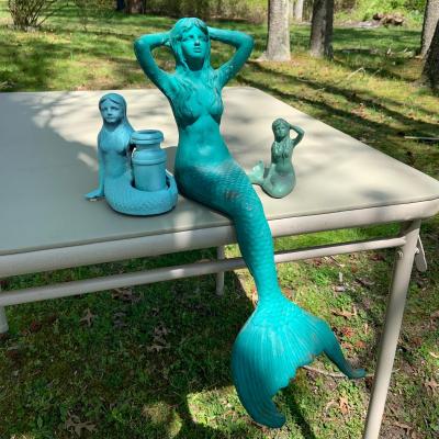 LOT 195: Vintage Painted Cast Iron Mermaids