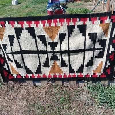 Beautiful Native design Rug appears handwoven.