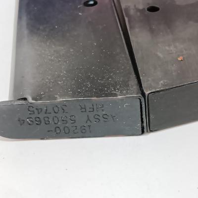 Two Magazines one marked 19200 Assy 5508694 MFR 30745 Colt 45 ACP 7 round