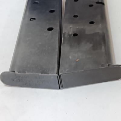 Two Magazines one marked 19200 Assy 5508694 MFR 30745 Colt 45 ACP 7 round