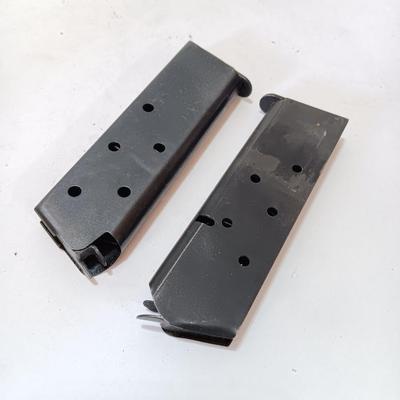 Two Magazines one marked 19200 Assy 5508694 MFR 30745 Colt 45 ACP 7 round