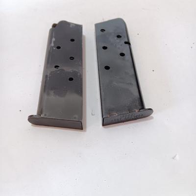Two Magazines one marked 19200 Assy 5508694 MFR 30745 Colt 45 ACP 7 round