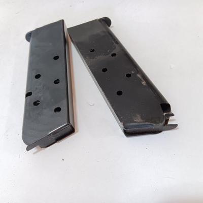 Two Magazines one marked 19200 Assy 5508694 MFR 30745 Colt 45 ACP 7 round