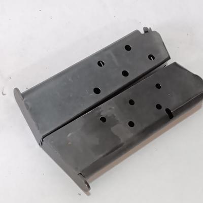 Two Magazines one marked 19200 Assy 5508694 MFR 30745 Colt 45 ACP 7 round