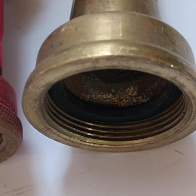 Two large brass firehose tips Fireman nozzles