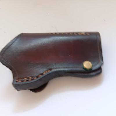 Leather pistol holster with leather magazine pouch