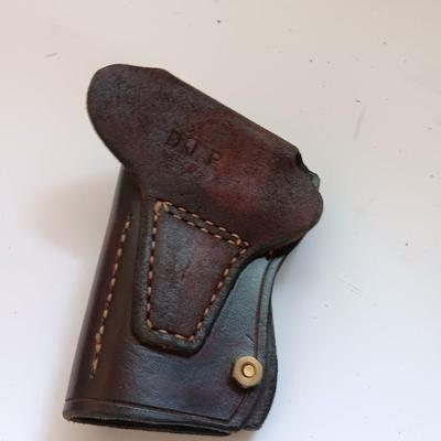 Leather pistol holster with leather magazine pouch