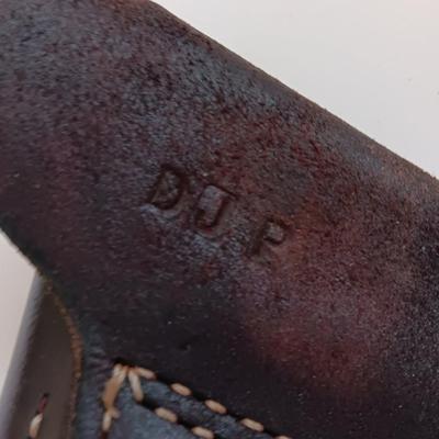 Leather pistol holster with leather magazine pouch