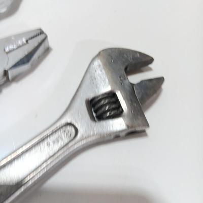 Variety of hand tools - Vise grips - pliers and an adjustable wrench