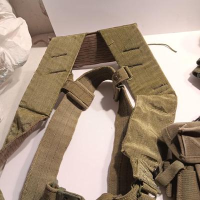 Large assortment of Military canvas bags and canteen with shoulder straps