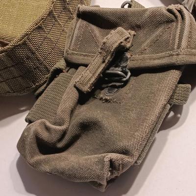 Large assortment of Military canvas bags and canteen with shoulder straps