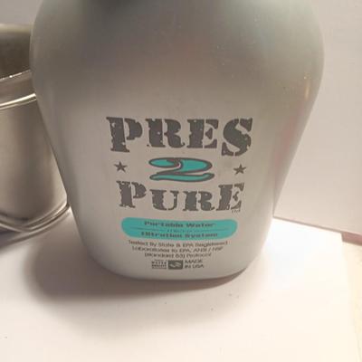 Large assortment of Military canvas bags and canteen with shoulder straps