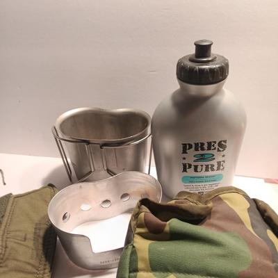 Large assortment of Military canvas bags and canteen with shoulder straps
