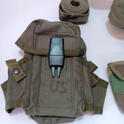 US Military canvass bags, a canteen, belt, camo face paint - face net and more