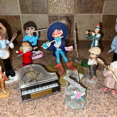 Eccentric Band of Figurines