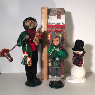 LOT 245G: Byer's Choice The Carolers w/ Box - 1997 Man Shopper, 1989 Boy w/ Gift, 1992 Snowman (no arms)
