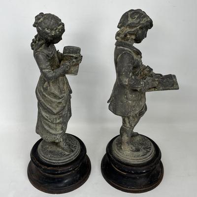 Cast Iron Antique Boy & Girl statues