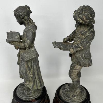 Cast Iron Antique Boy & Girl statues