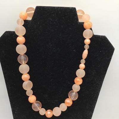 Peach colored bulky necklace
