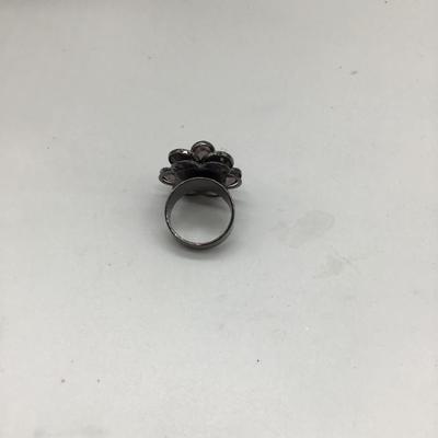 Dark colored flower ring