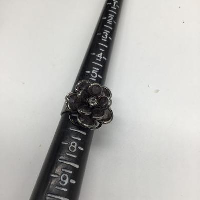 Dark colored flower ring