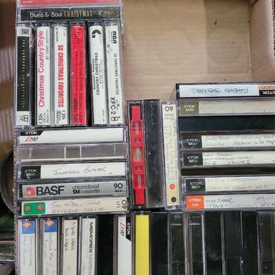 Lot of Christmas cassette tapes and cases