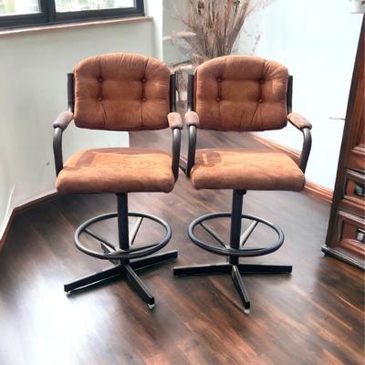 Pair of revolving metal bar stools