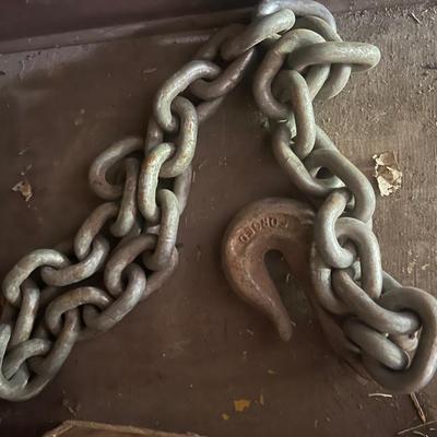 Wood box with various chains and metal tub