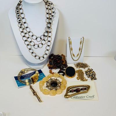 Lot 238: Hand Crafted Vegetable Ivory Bracelet & Gold Tone Collection Brooches, Necklaces, Bracelets