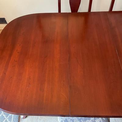 Queen Anne Cherry Dining Room Table with 6 chairs.