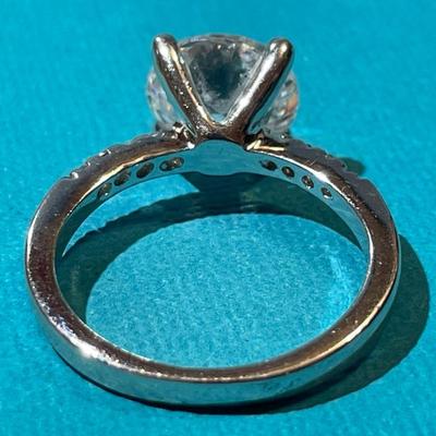 Vintage Silver-toned Fashion CZ Engagement Style Ring w/Center CZ Stone Measuring about 1.75 Carats in VG Preowned Condition.