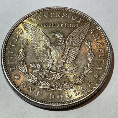 1886-P NICE ORIGINAL TONED UNCIRCULATED MORGAN SILVER DOLLAR AS PICTURED.