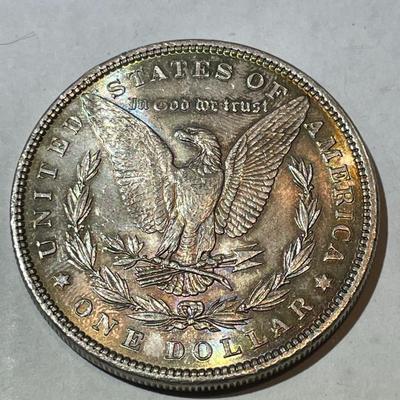 1886-P NICE ORIGINAL TONED UNCIRCULATED MORGAN SILVER DOLLAR AS PICTURED.