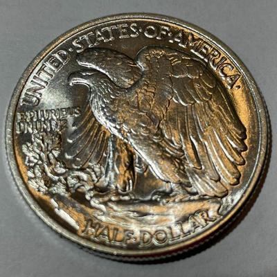 1946-P CHOICE UNCIRCULATED CONDITION WALKING LIBERTY HALF DOLLAR AS PICTURED.