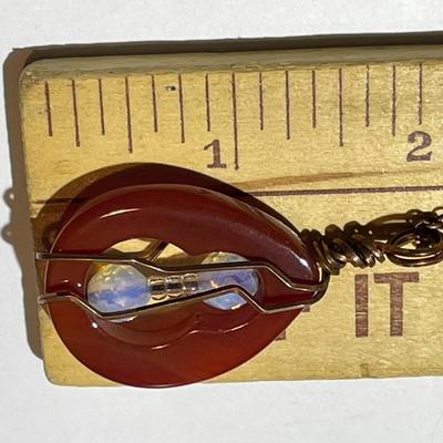 Vintage Carnelian Pendant on a 24" Copper Chain in VG Preowned Condition.