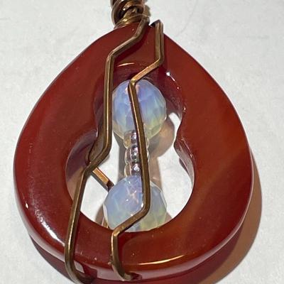 Vintage Carnelian Pendant on a 24" Copper Chain in VG Preowned Condition.