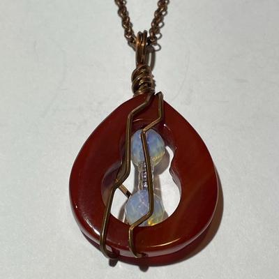 Vintage Carnelian Pendant on a 24" Copper Chain in VG Preowned Condition.