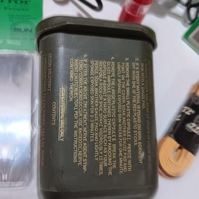 compass backpack with a variety of Bug out gear - decontamination kit - light - rope and more