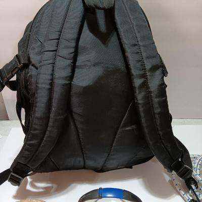 compass backpack with a variety of Bug out gear - decontamination kit - light - rope and more
