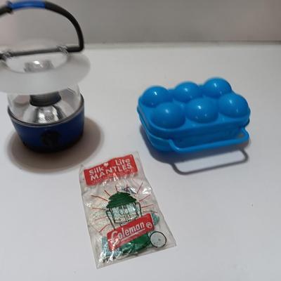 compass backpack with a variety of Bug out gear - decontamination kit - light - rope and more