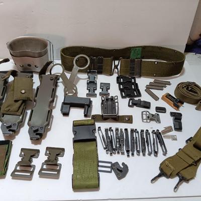 Large assortment of hooks and clips for military issued belts and tactical vests - knife sheaths - belt - canteen pieces.