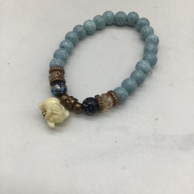 Blue beaded bracelet with elephant charm