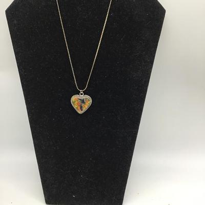 Colorful specks inside heart charm necklace
