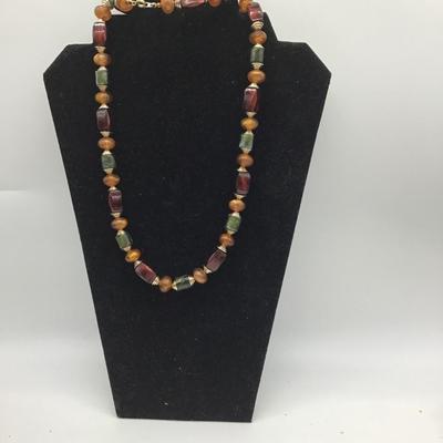 Red, orange, and green beaded necklace