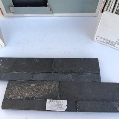 Boxes of black tile American Olean & Charcoal ledgestone