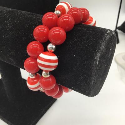 Red and red and white stripe beaded bracelets