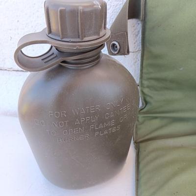 Military Issued inflatable mattress pad with canvas bag, canteen and cushion chair seat
