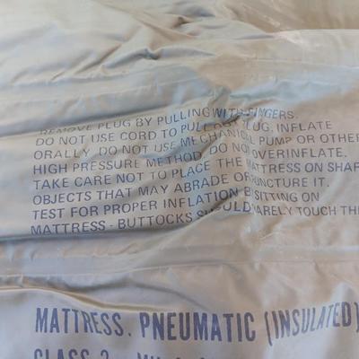 Military Issued inflatable mattress pad with canvas bag, canteen and cushion chair seat