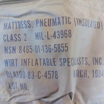 Military Issued inflatable mattress pad with canvas bag, canteen and cushion chair seat