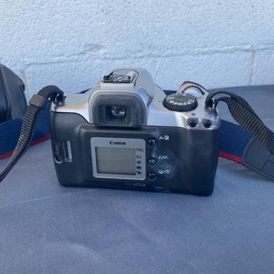 A Fun Polaroid sun600 Camera, with a EOS Canon Rebel E2 Camera